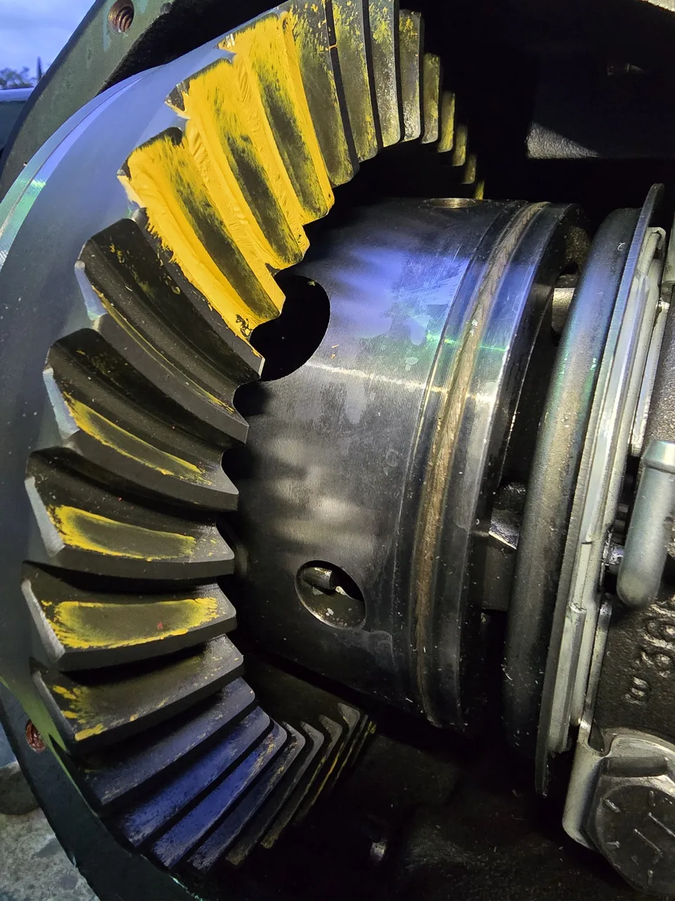 Checking the gear pattern with marking compound on a new ring and pinion