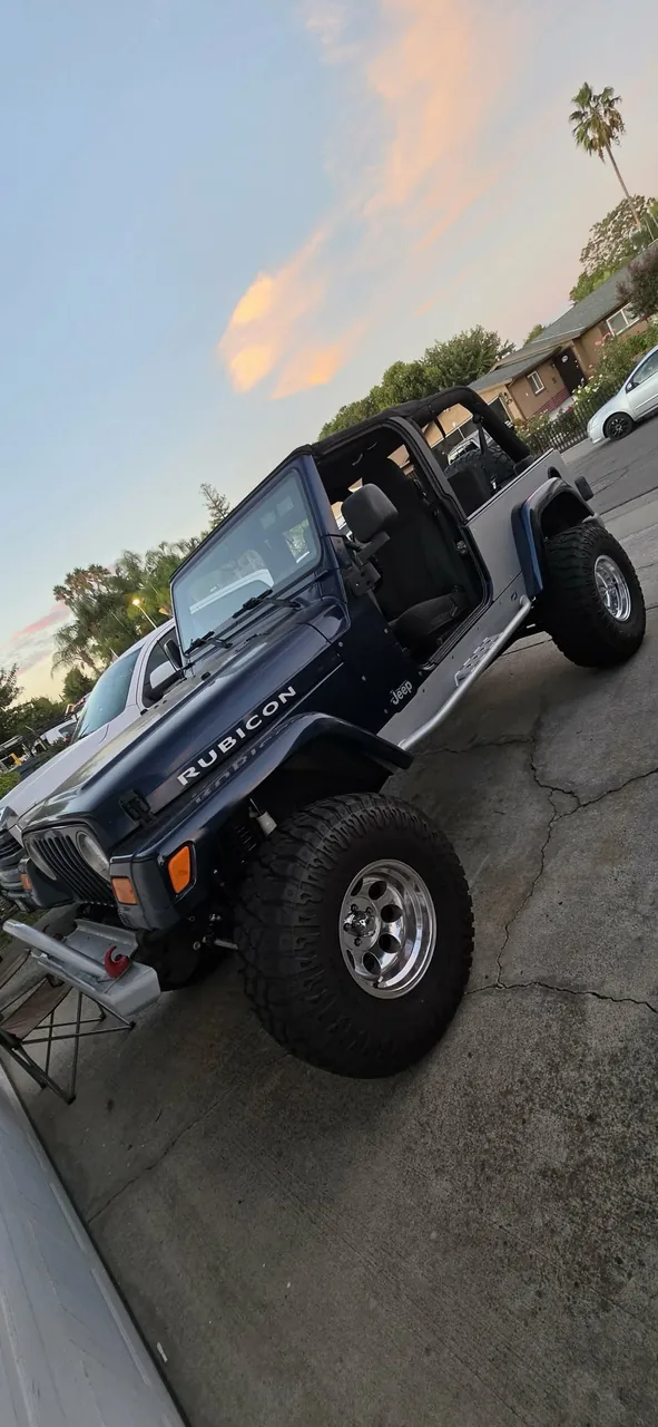 Black Jeep Wrangler Rubicon with lift kit and front bumper