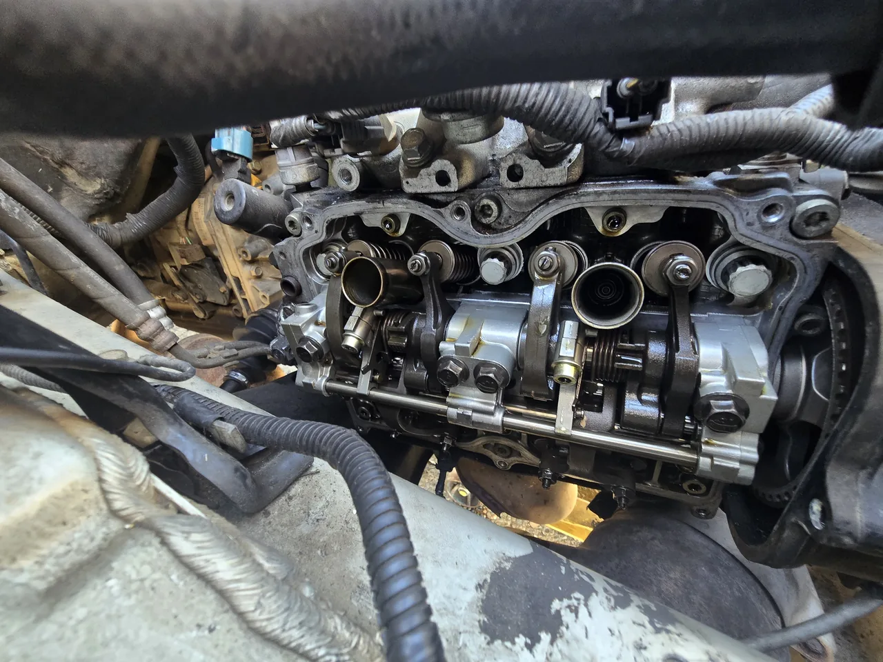 Valve cover removed showing the camshafts underneath